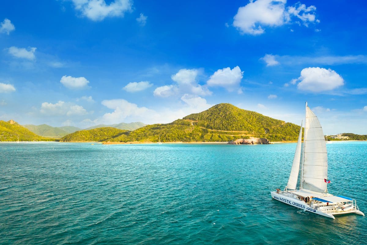 Catamaran sailing at Five Islands Harbour - Antigua and Barbuda Tourism Authority