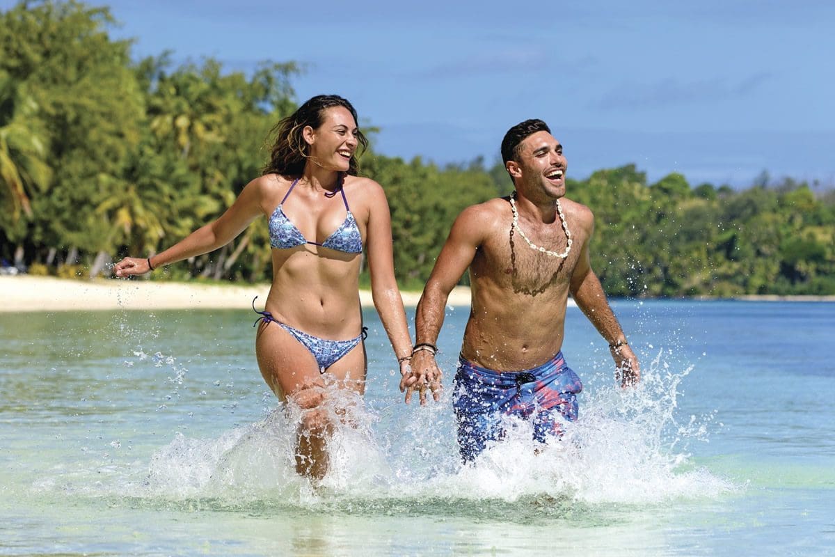 Couple in Yasawa's waters - Tourism Fiji/Chris McLennan
