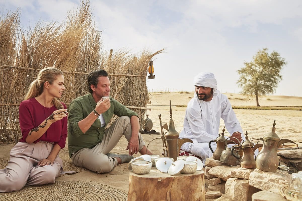 Enjoying Arabian coffee at a Bedouin camp - Dubai Tourism