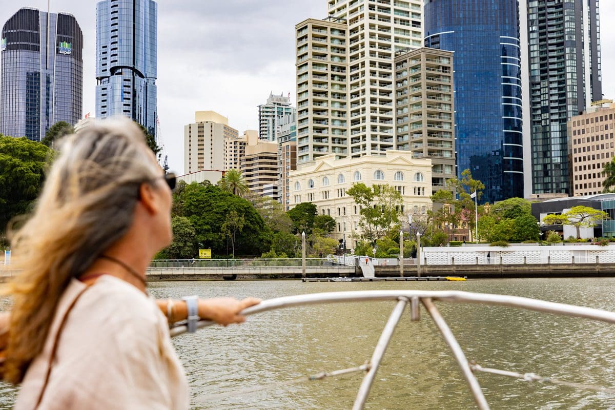 Enjoying Brisbane River City cruise - Tourism Australia