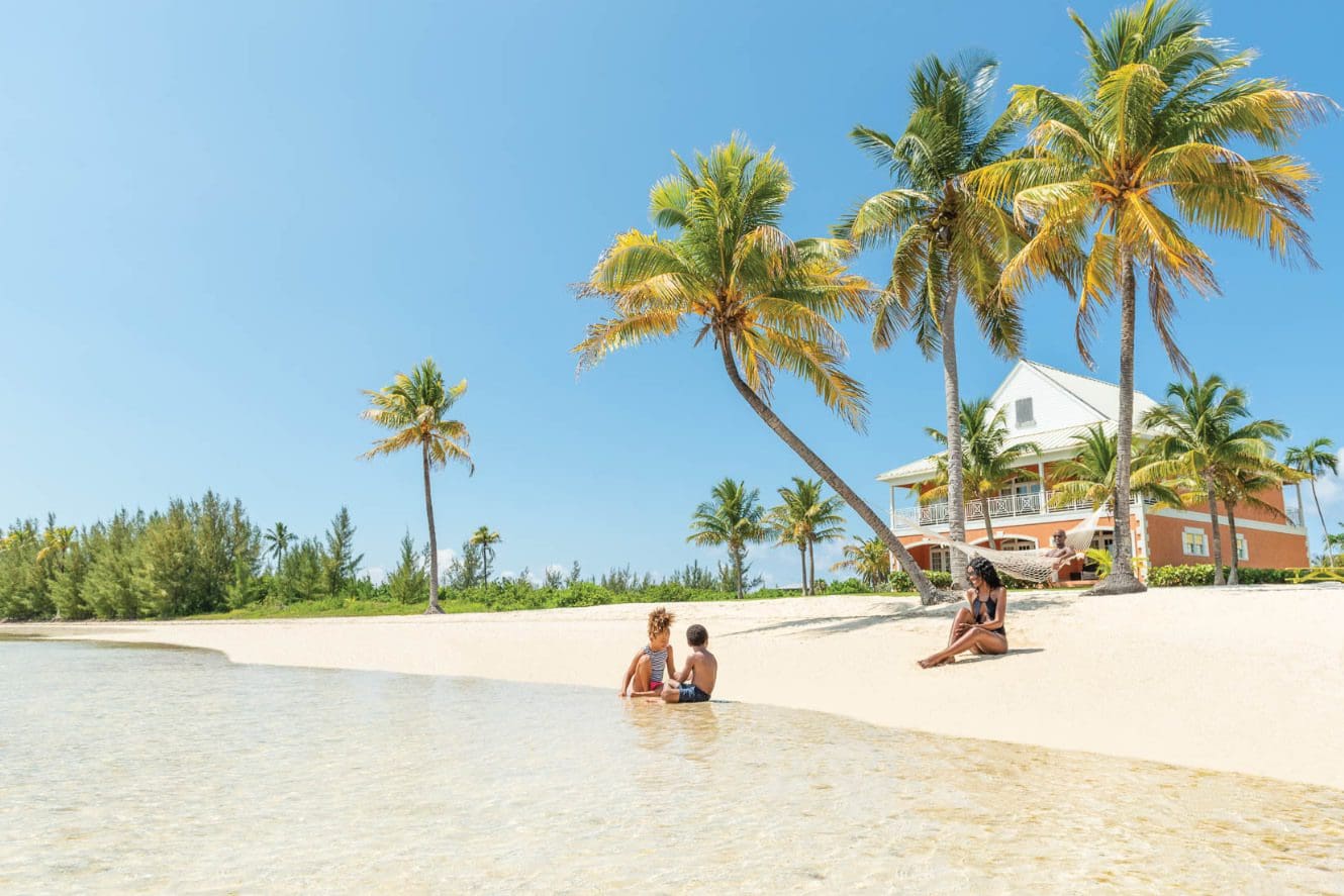 Family enjoying beach time - Bahamas Tourism Centre