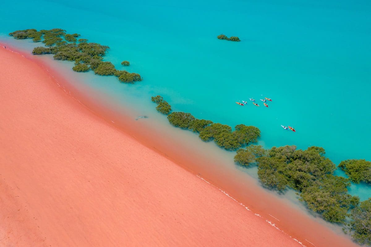Kayakers along the shores of Roebuck Bay in Broome, Western Australia - Tourism Australia