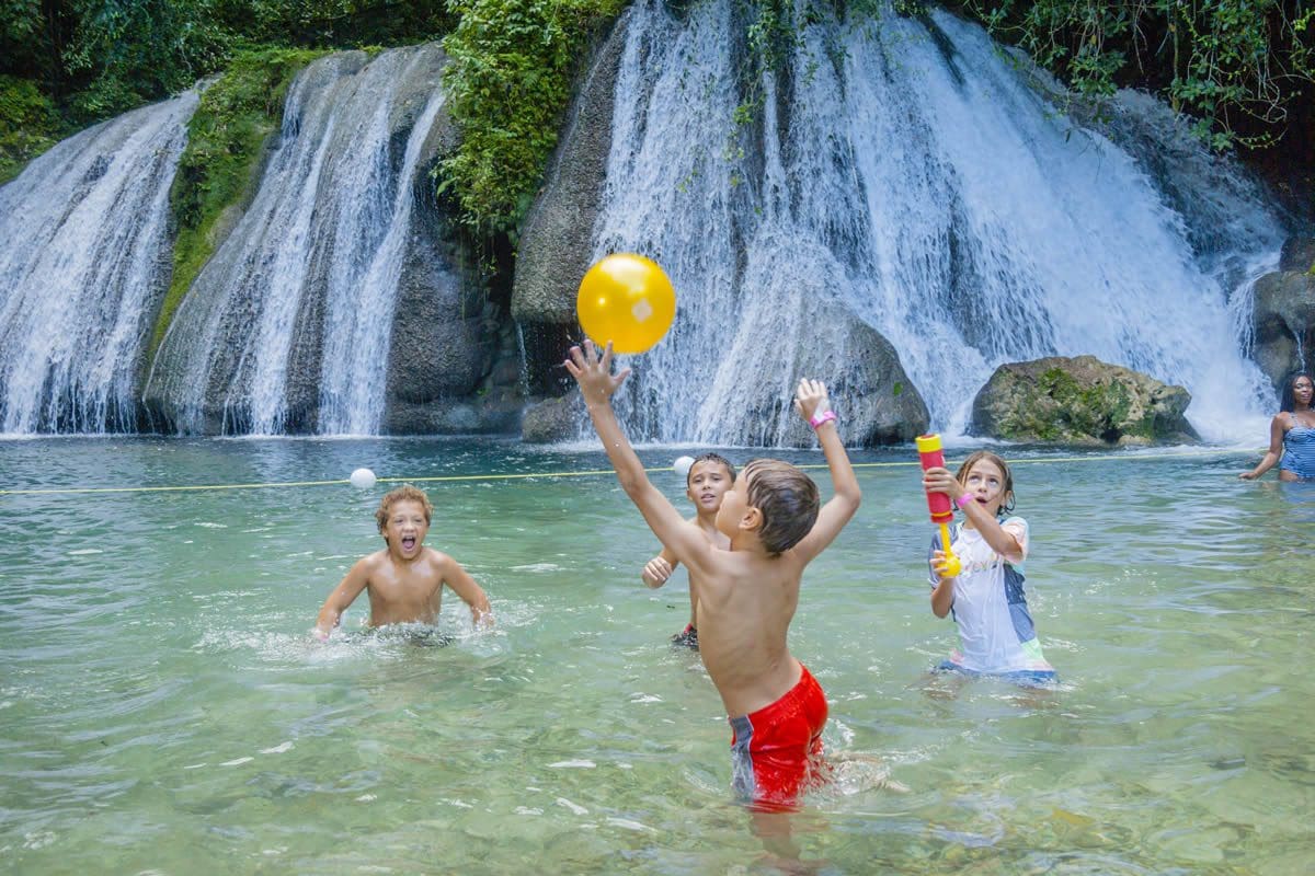 Kids playing at Reach Falls, Jamaica Tourist Board