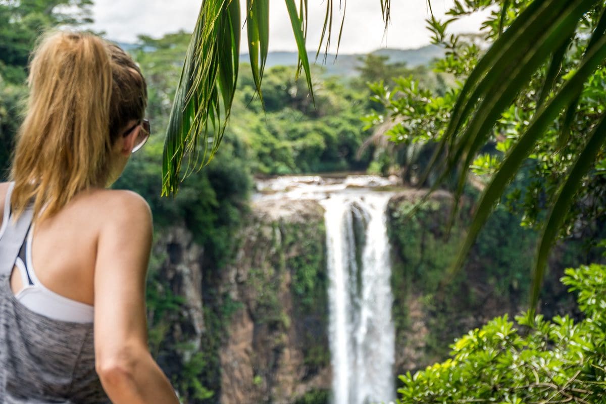 Lady viewing the falls - Mauritius Tourism