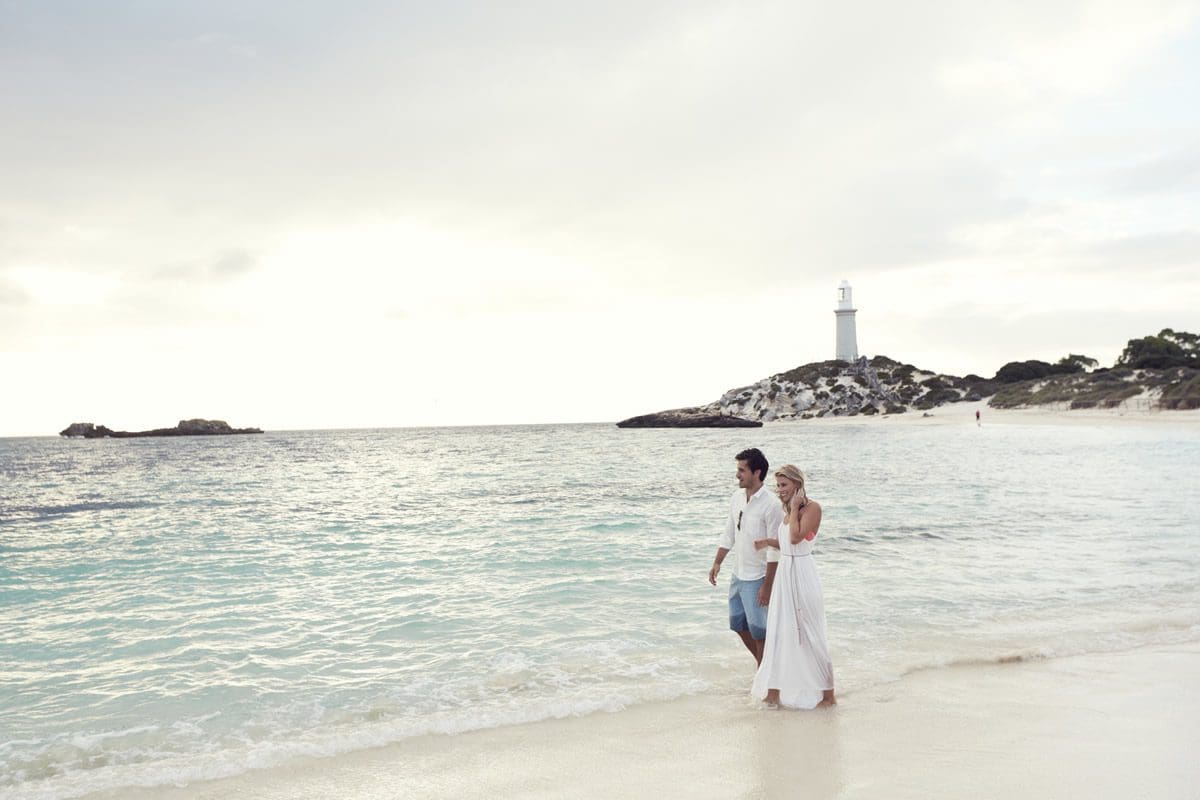 Walking the shore of Pinky Beach, Rottnest Island - Tourism Australia