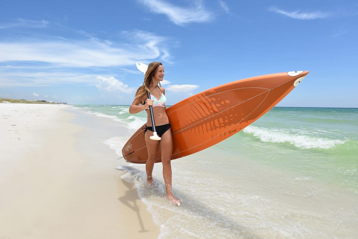 Stand-up paddleboarder in Grayton Beach State Park - Visit Florida/Peter W. Cross/Patrick Farrell