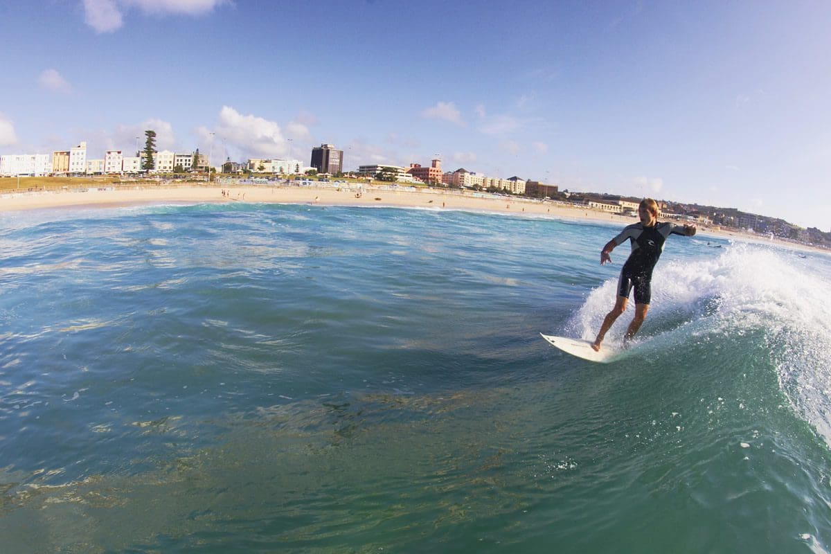 Surfing at Bondi Beach, Sydney - Tourism Australia