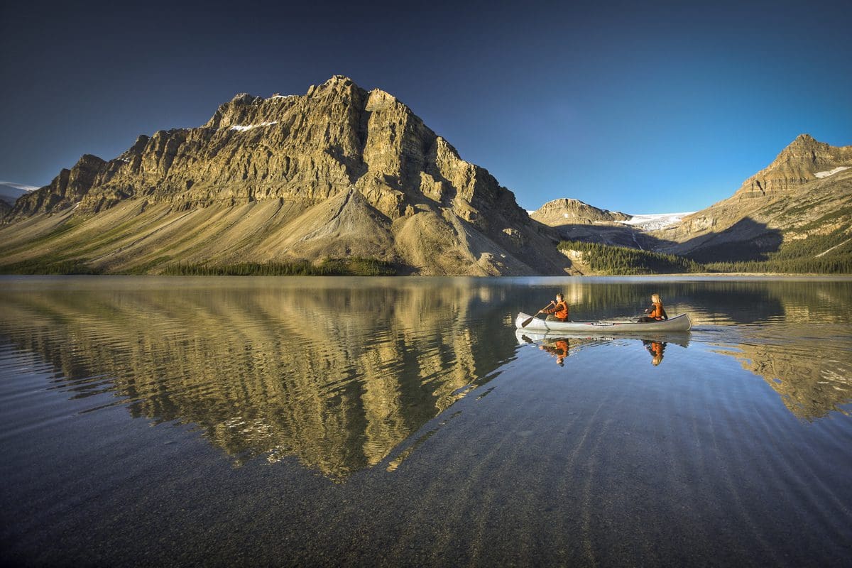 Two people canoe Bow Lake - Banff & Lake Louise Tourism/Paul Zizka