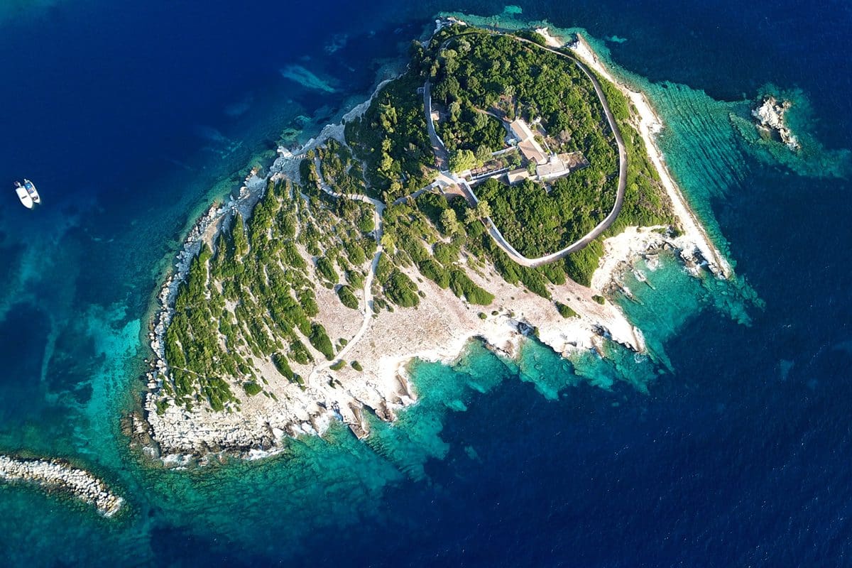 Aerial drone view of the tiny Panagia Island, off the coast of Paxos