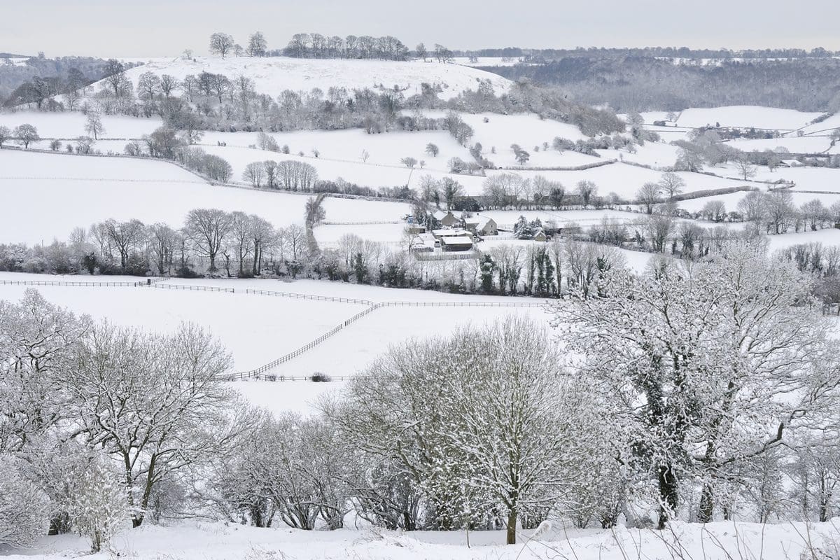 Snow over Downham Hill in the Cotswolds