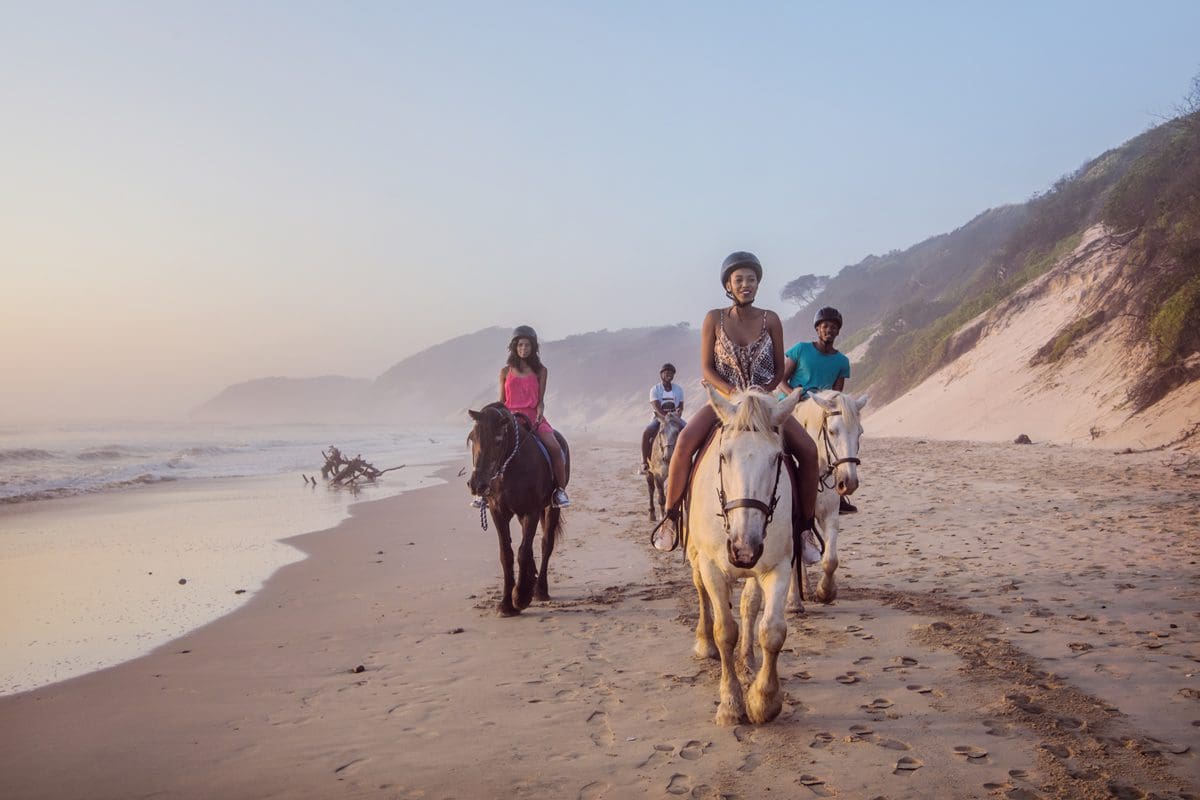 Horse riding on the beach in the Eastern Cape - South African Tourism