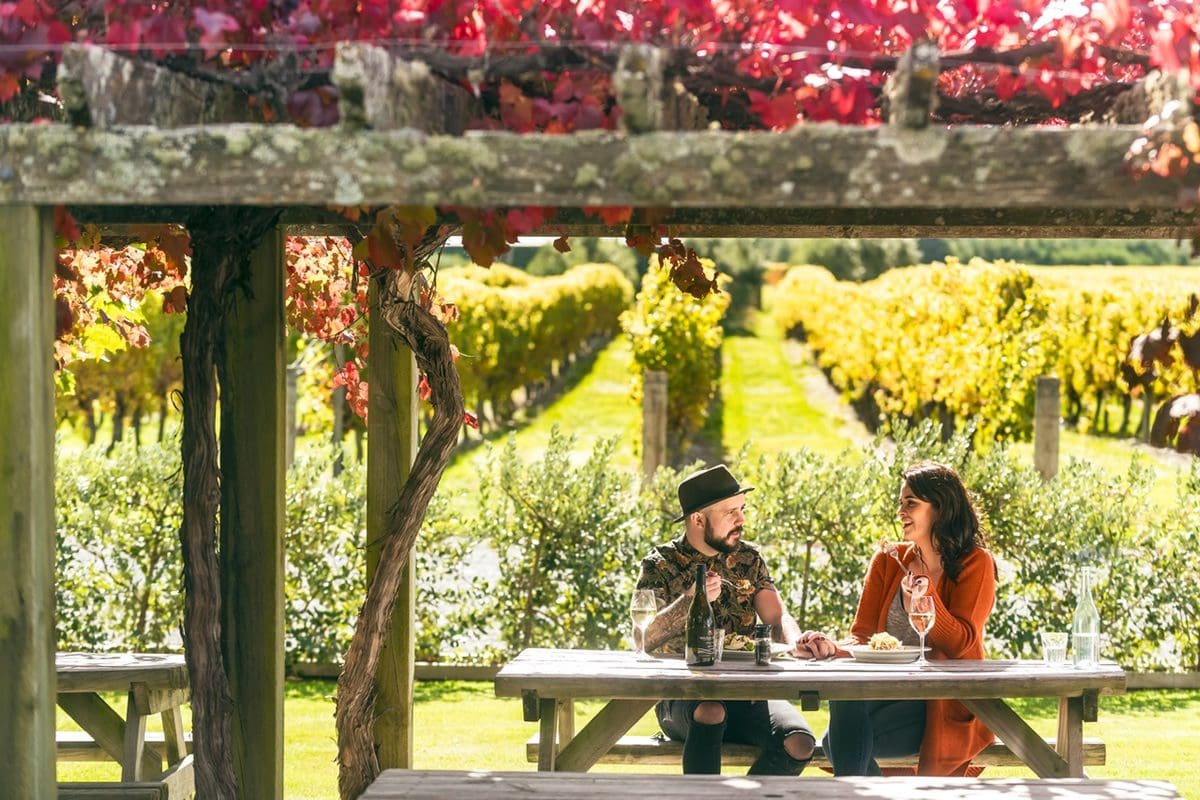 Couple eating at the Wairau River Restaurant in Malborough, NZ