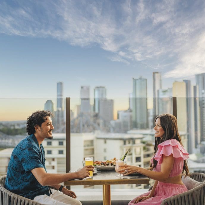 Couple enjoying Iris Rooftop, Brisbane - Tourism and Events Queensland