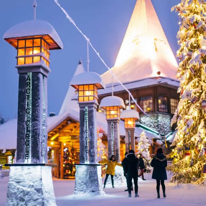 Crossing the Arctic Circle at Santa Claus Village, Lapland - Visit Finland/Rovaniemi