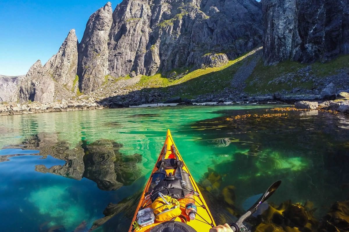 Kayaking in Refsvika, Lofoten - Visit Norway/Tomasz Furmanek