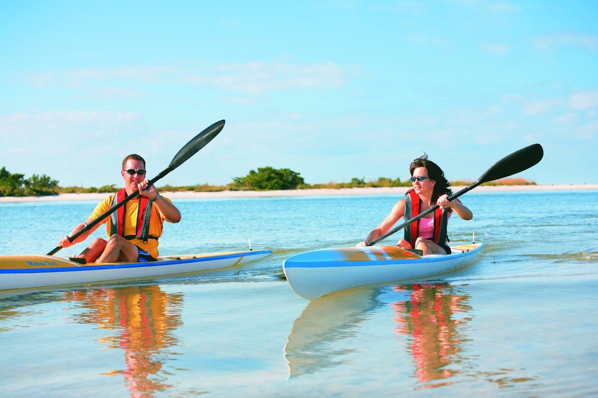 Couple kayaking - Lee County Visitor Convention Bureau/The Beaches of Fort Myers & Sanibel