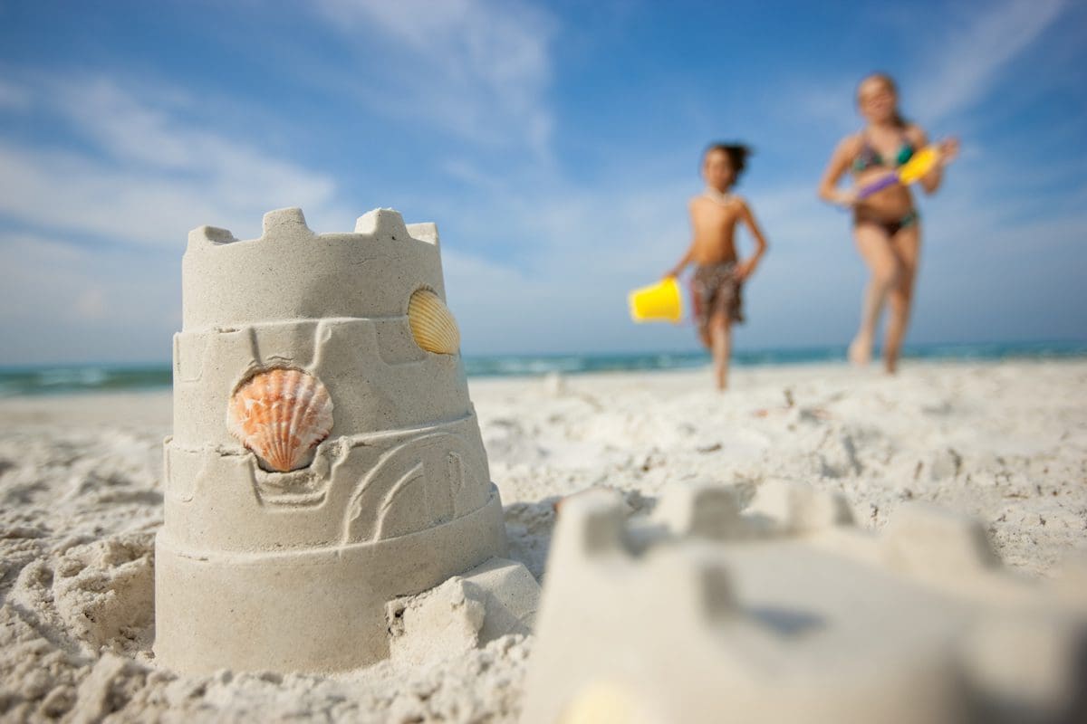 Kids with sandcastles in Fort Myers - Jason Lindsey