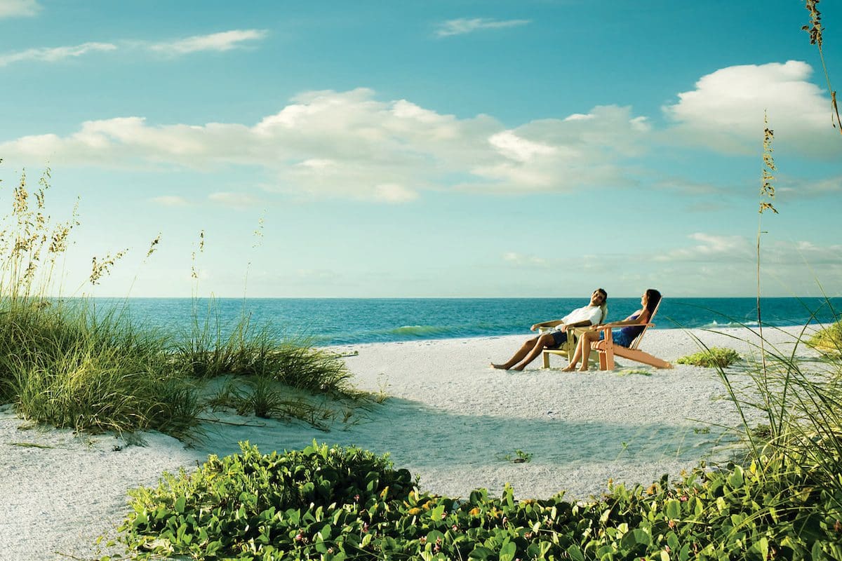 Relaxing on the beach - Lee County Visitor Convention Bureau