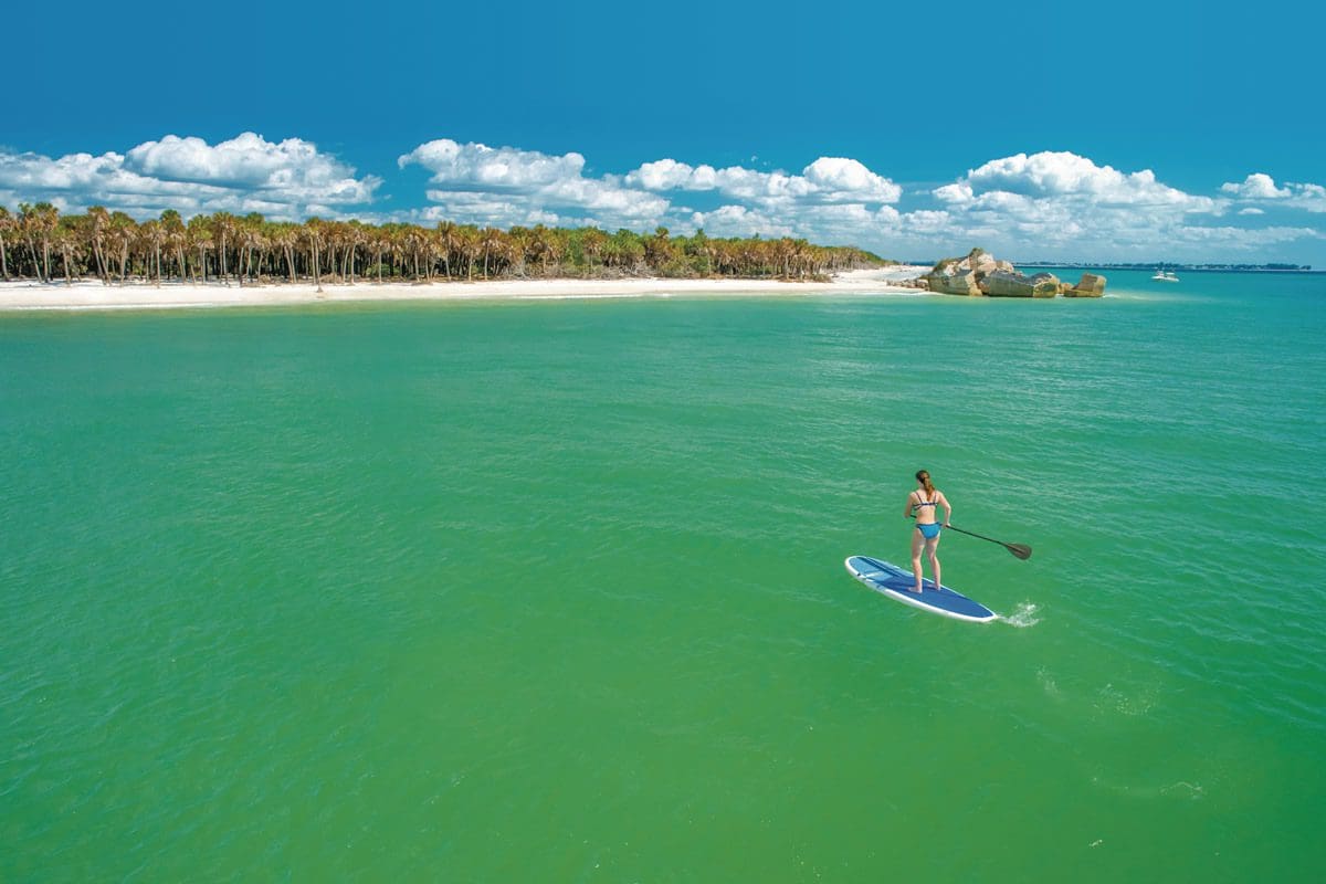 Stand-up paddleboarding to Egmont Key - VisitStPeteClearwater.com/MONS