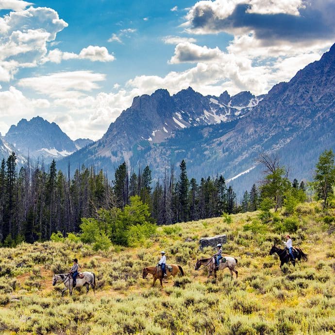Horseback riding at Redfish, near Stanley - Idaho Tourism