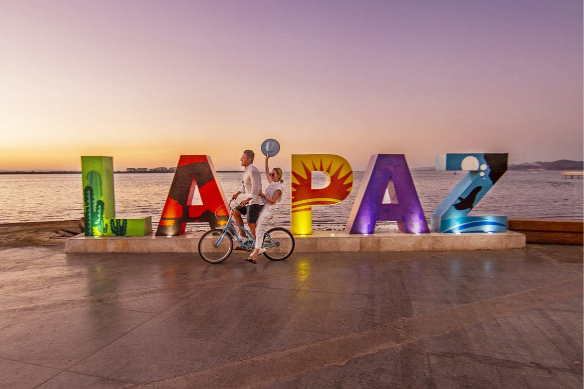 Cycling by the La Paz letters - La Paz Tourism