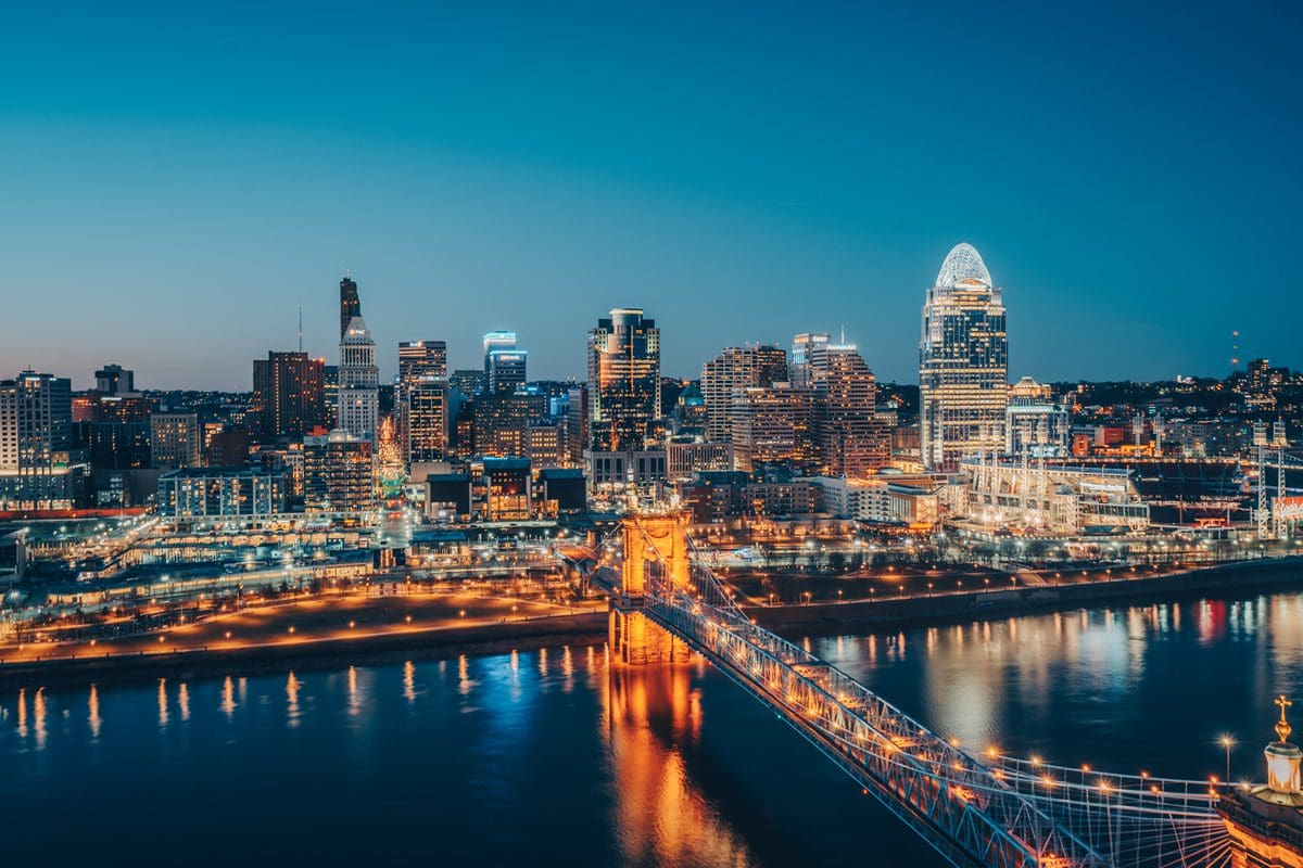 Cincinnati skyline, Roebling Bridge at night - Visit Cincy