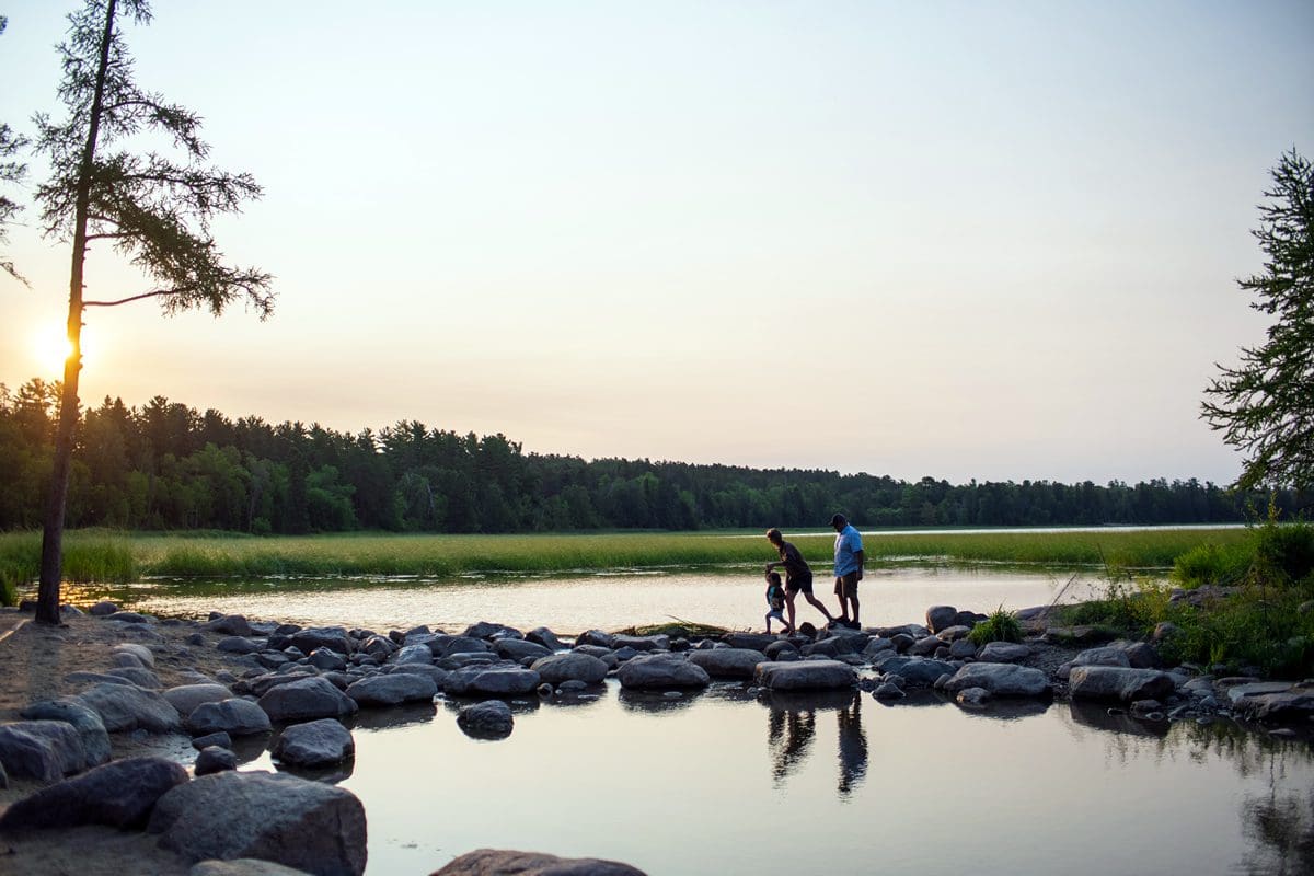 Family at Itasca State Park's Mississippi headwaters - Explore Minnesota/KVIDT Creative
