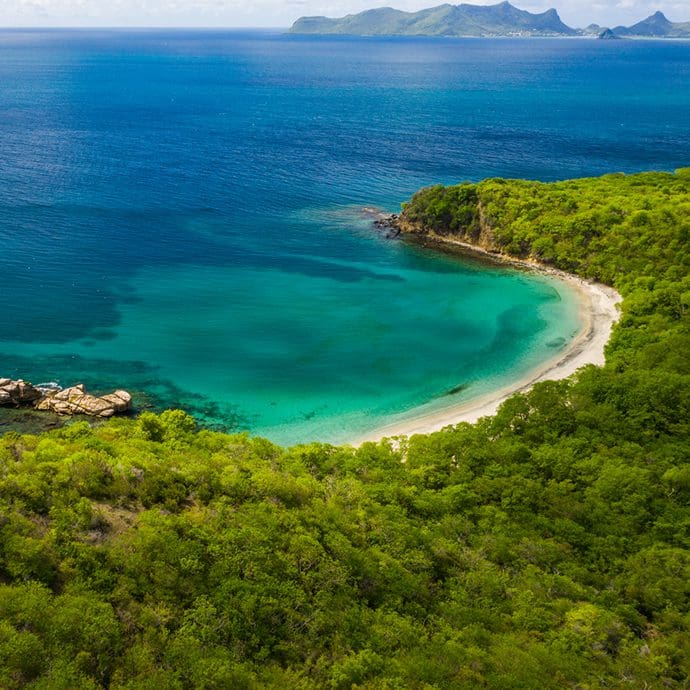 Aerial view of Anse La Roche Beach in Carriacou - Pure Grenada