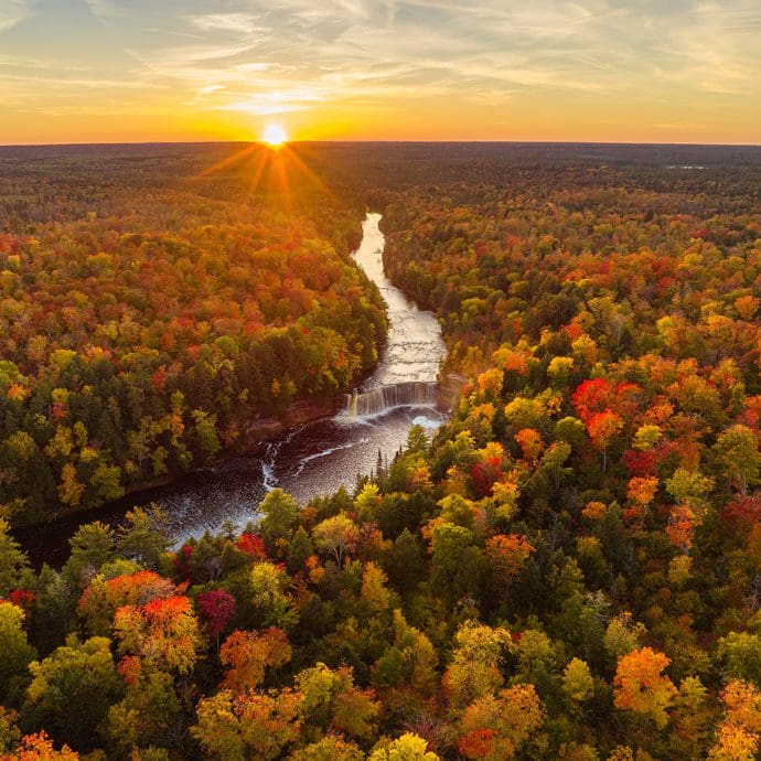 Aerial river and waterfall view by the 510 bridge - Pure Michigan Aerial river and waterfall view by the 510 bridge - Pure Michigan