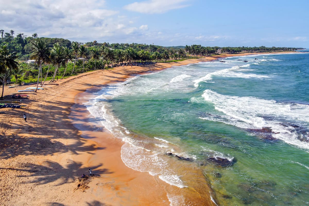 Palm-fringed Ivory Coast beach