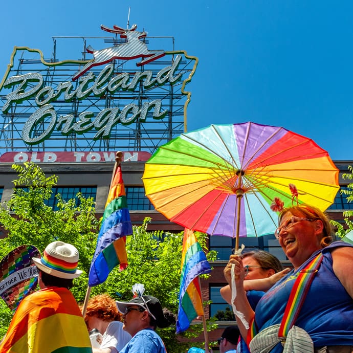 White Stag sign during Pride parade - Travel Portland - Diego Diaz White Stag sign during Pride parade - Travel Portland - Diego Diaz