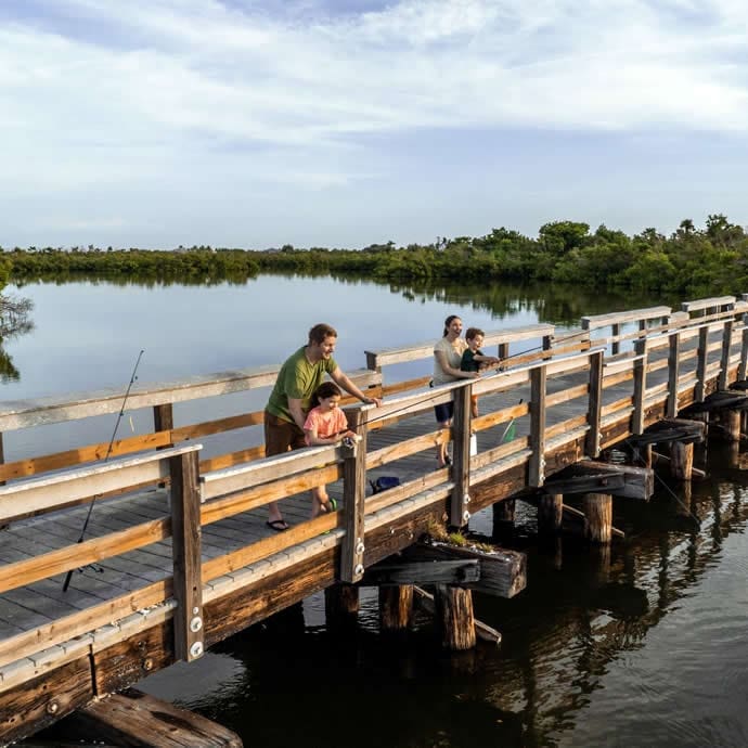 Family fishing at Centennial Fishing Pier – Punta Gorda/Englewood Beach Visitor & Convention Bureau