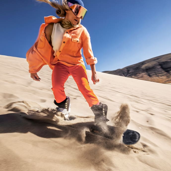 Sand boarder on Sand Mountain Recreational Area - Travel Nevada/Jamie Kingham