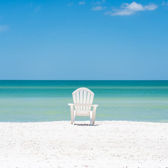 White beach chair - Visit St. Pete-Clearwater